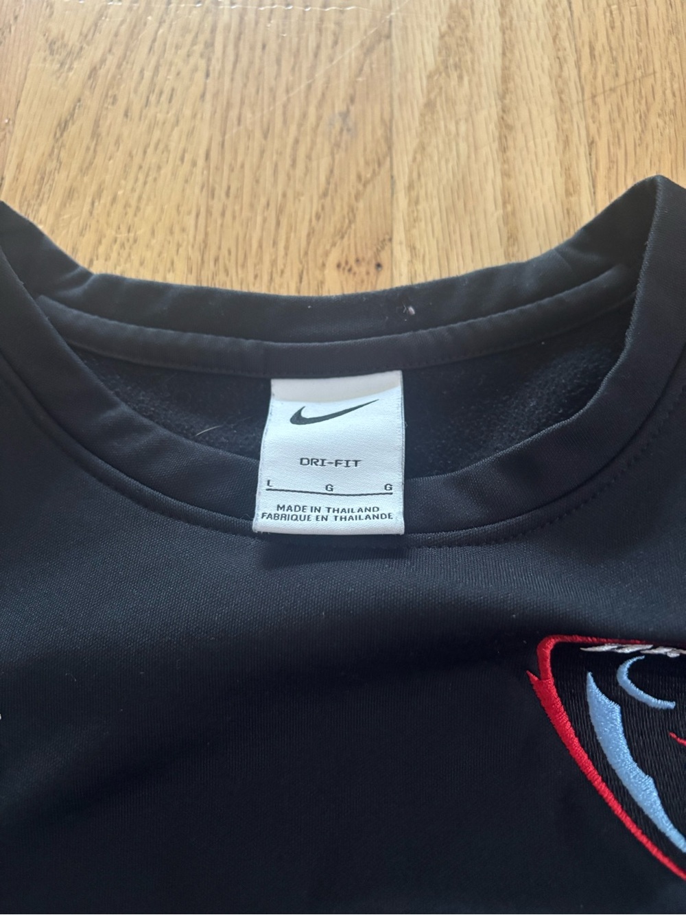 Nike Black Long Sleeve Dri-FIT Top with Red & Light Blue Crest - Picture 2 of 3